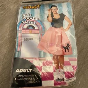 50th poodle women customer. Comes with bow and glasses. The glass has a crack